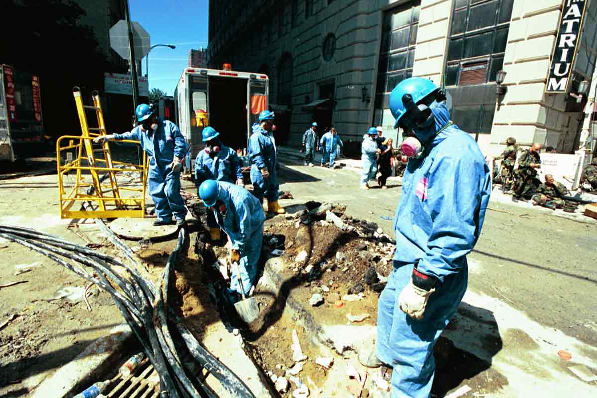 Con Edison crews repair underground wiring near ground zero after nine eleven.