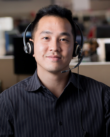 An Orange and Rockland customer service representative wearing a headset.