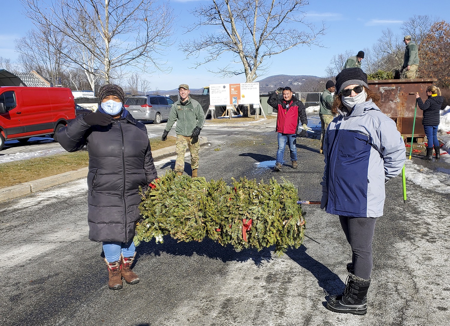 O&R employees collecting holiday wreaths